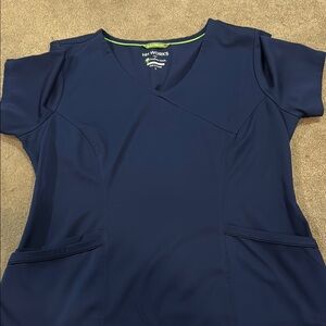 Fitted navy blue scrub top